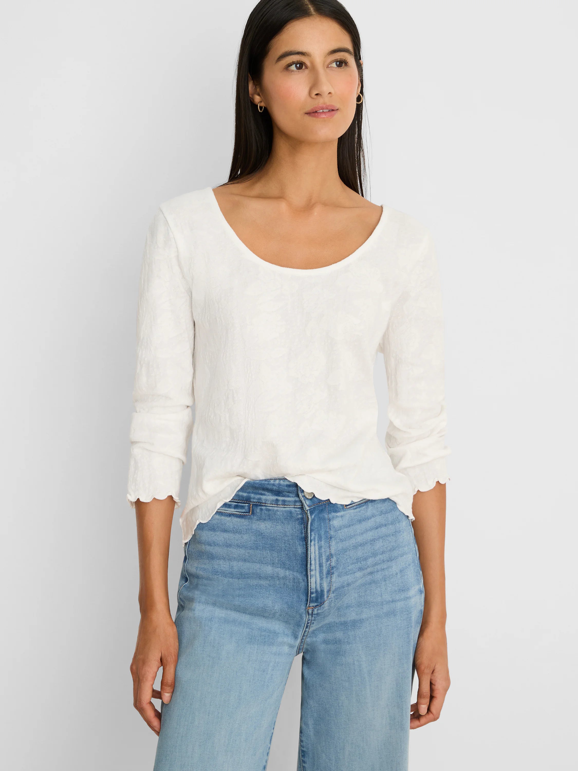 Off-white 3/4 sleeve scoop neck tee with subtle lace knit fabric, scalloped cuffs and hem.