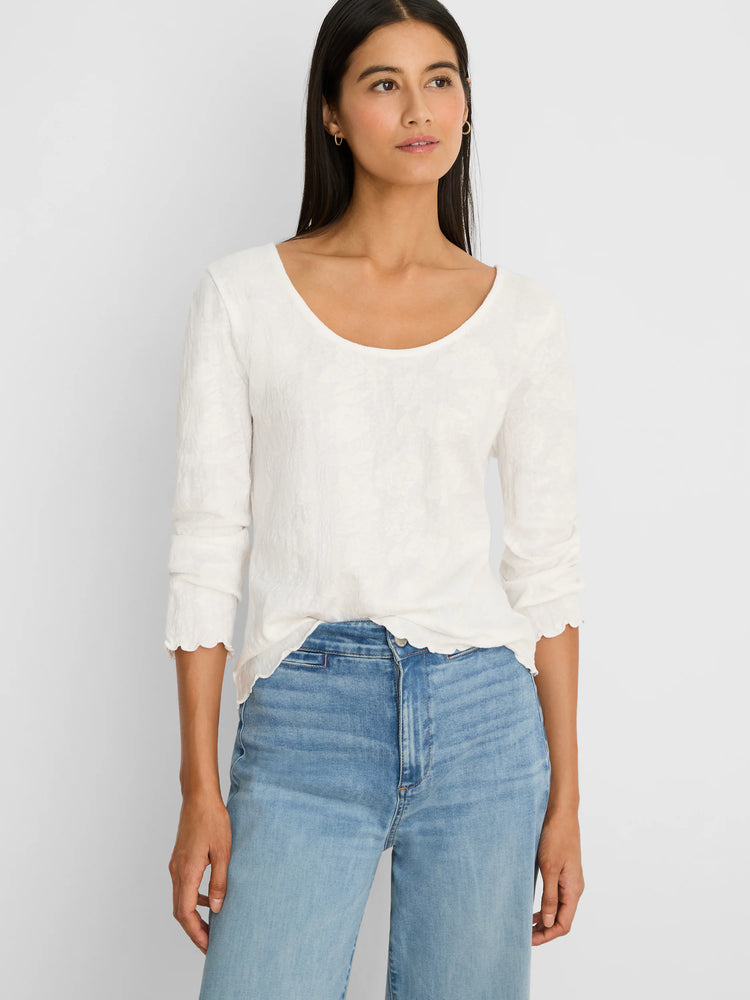 Off-white 3/4 sleeve scoop neck tee with subtle lace knit fabric, scalloped cuffs and hem.