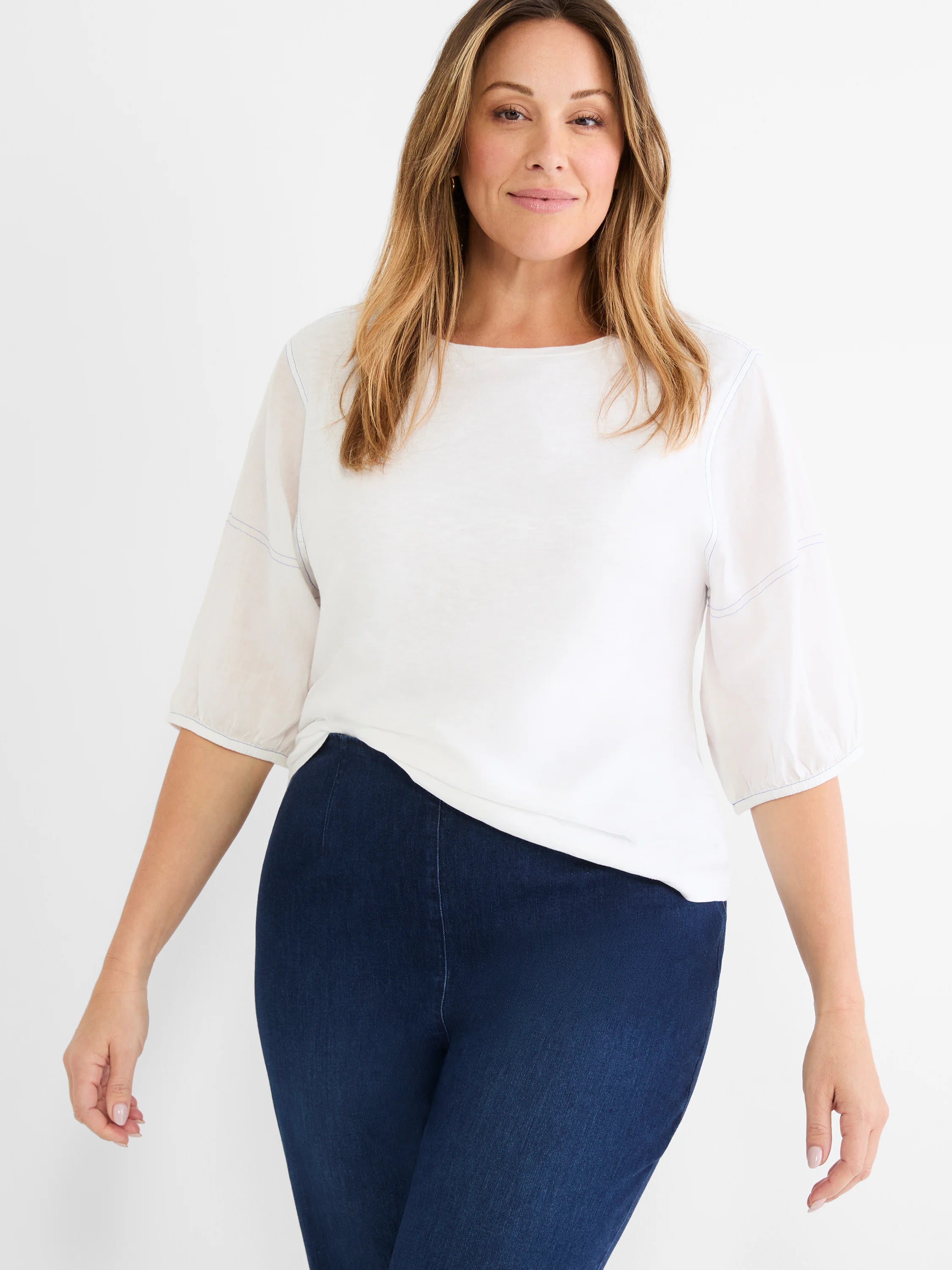 White cotton tee with sheer 3/4 length linen sleeves, gathered cuffs, and subtle blue seam stitching.