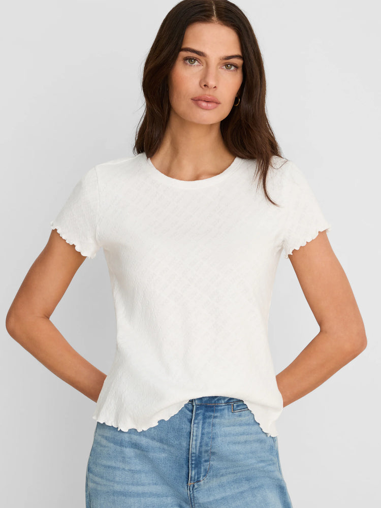 White lace knit t-shirt with a textured pattern, short sleeves, and scalloped hems.