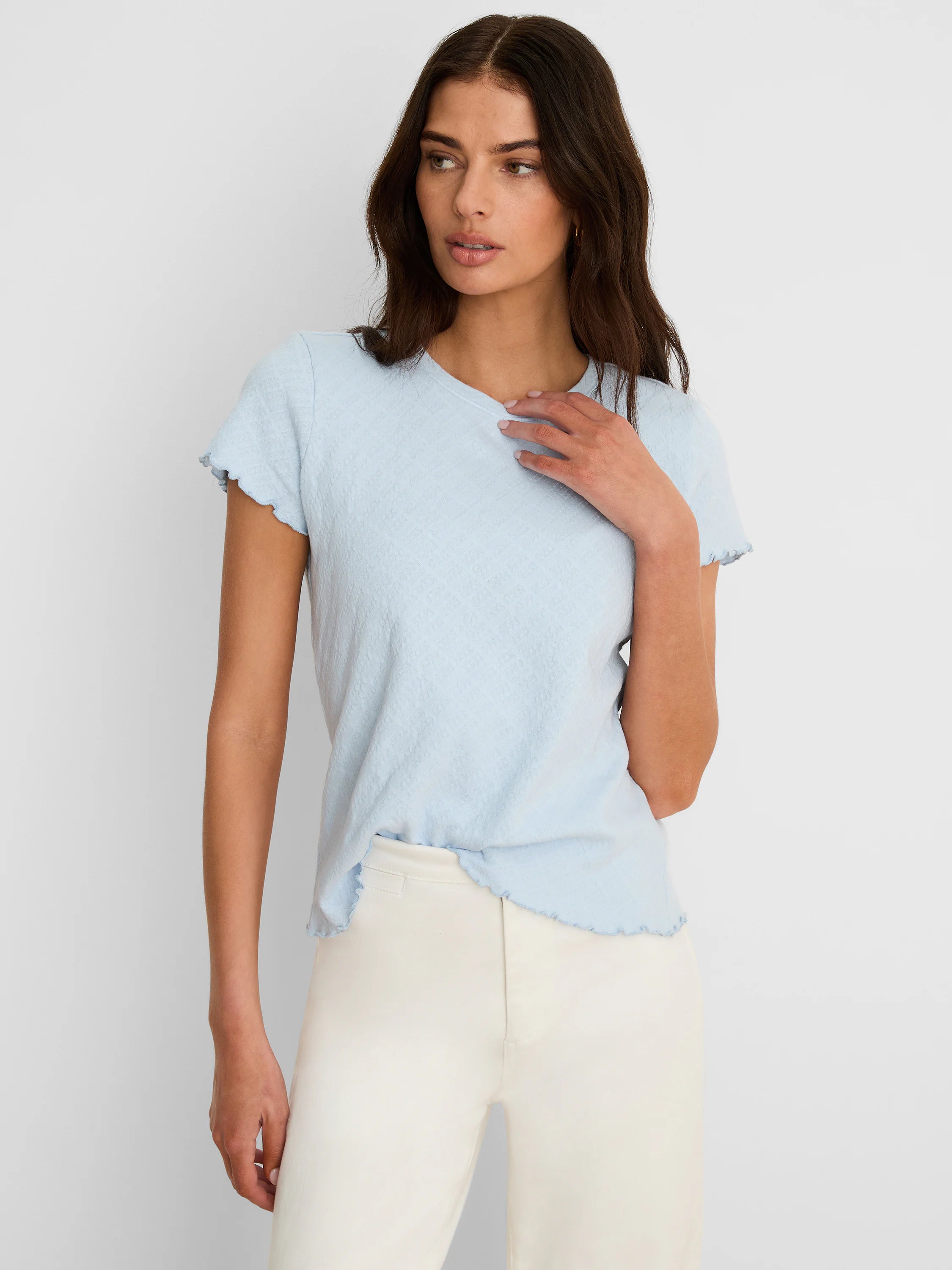 Pale blue V-neck lace knit t-shirt with short sleeves and scalloped edges.