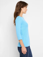 Sky blue 3/4 sleeve boat neck tee, heathered texture.