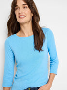Light blue boat neck tee with 3/4 sleeves and a subtle heathered texture.