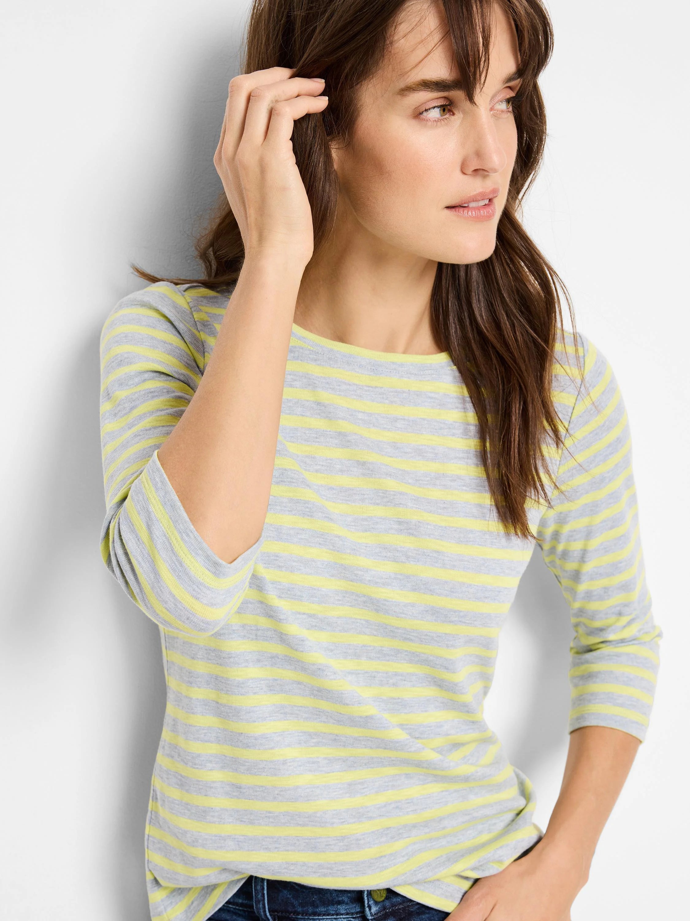 Light grey and pale yellow horizontally striped 3/4 sleeve boat neck tee.