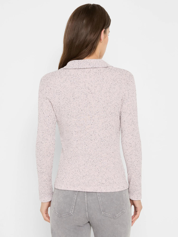 Light pink ribbed knit long sleeve polo with dark speckles and a collar, shown from the back.