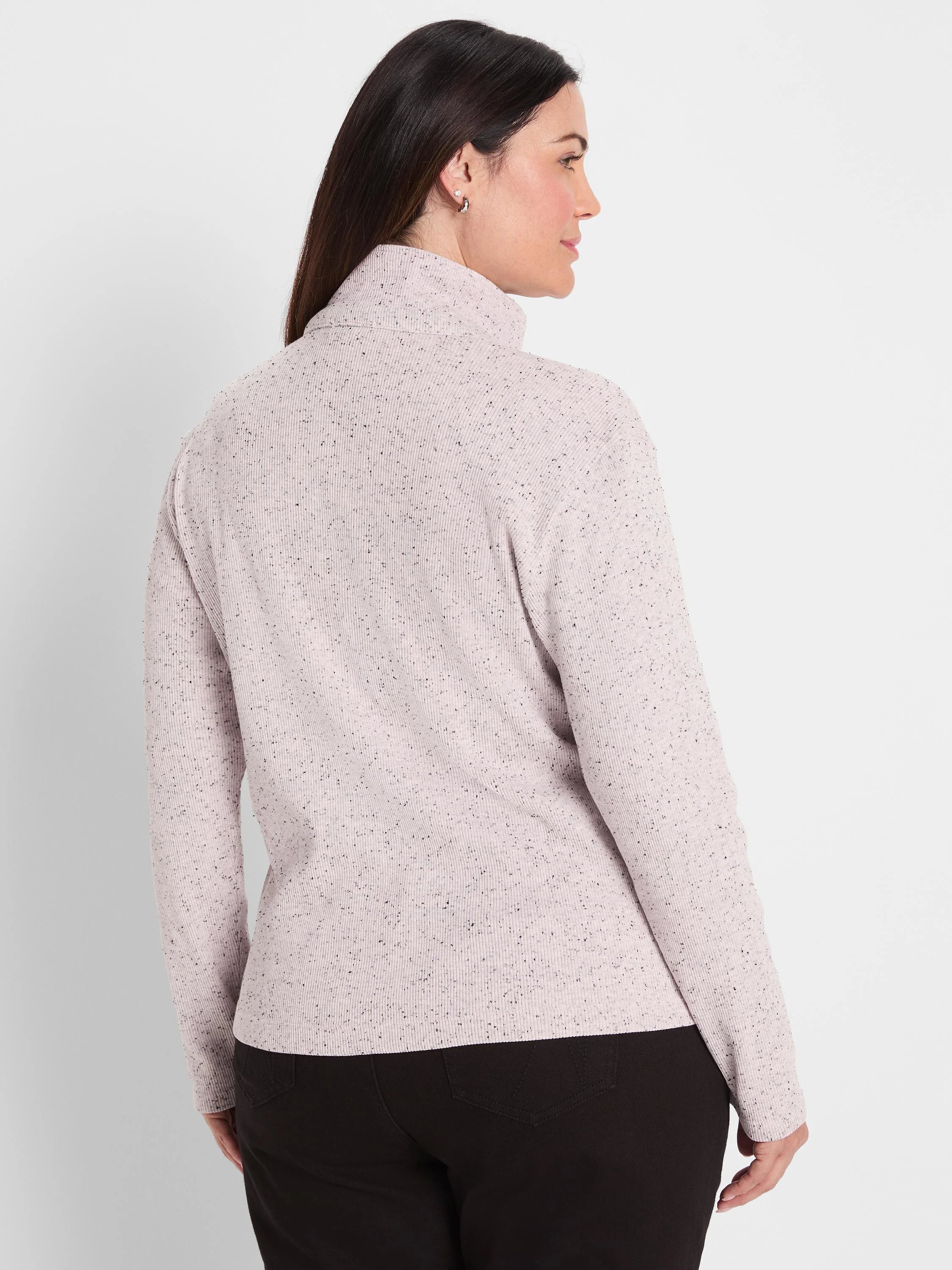 Pale pink flecked, ribbed long sleeve top with a mock neck.