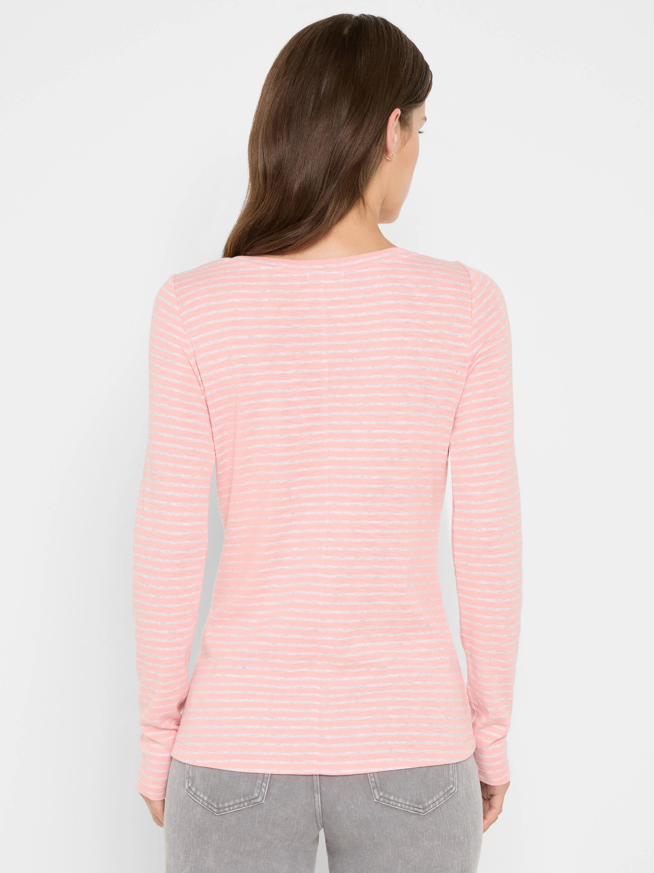 Pink long sleeve boat tee with thin horizontal light grey stripes, back view.