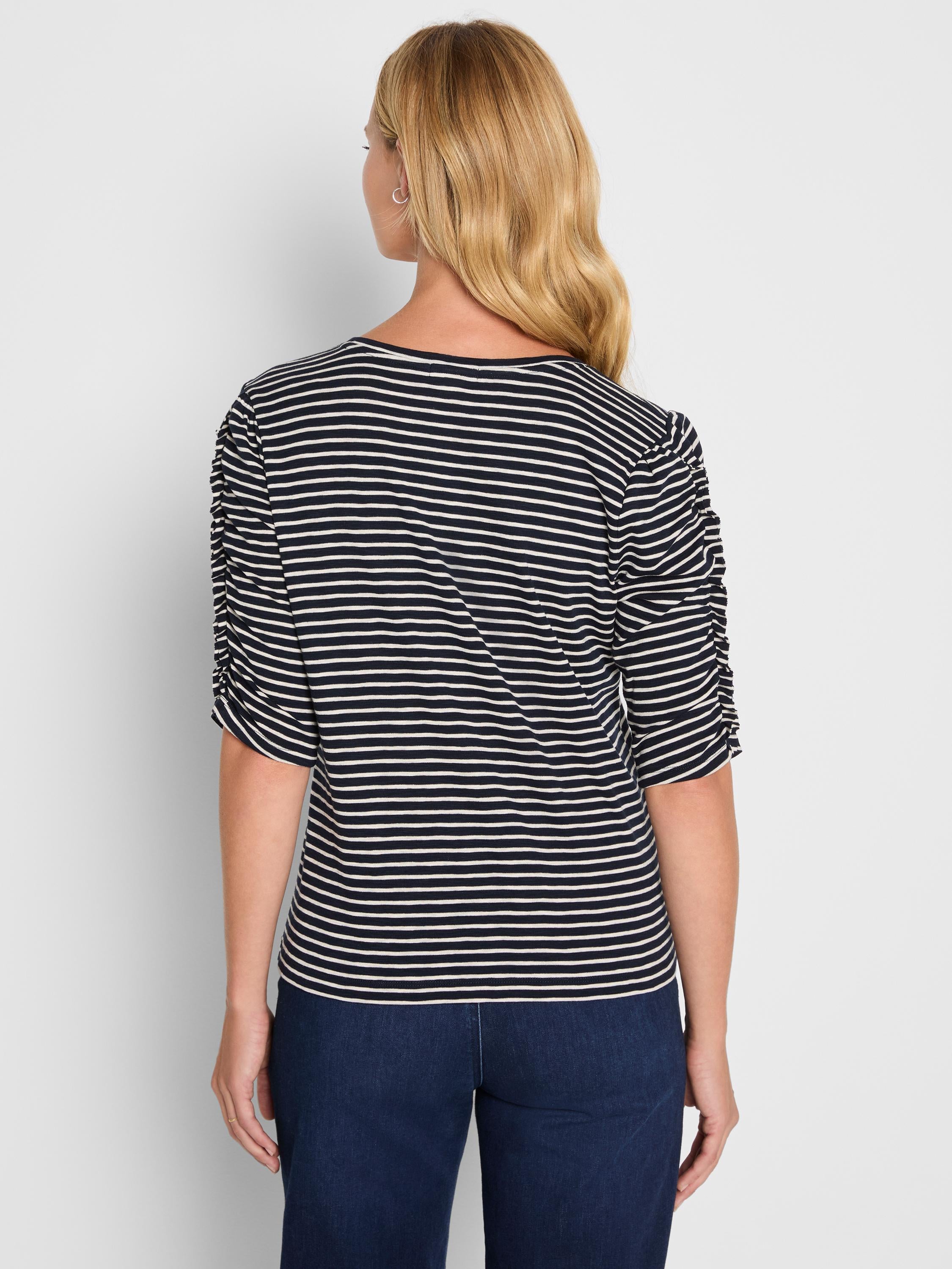 Navy and white striped knit tee featuring ruched three-quarter sleeves and a relaxed fit.