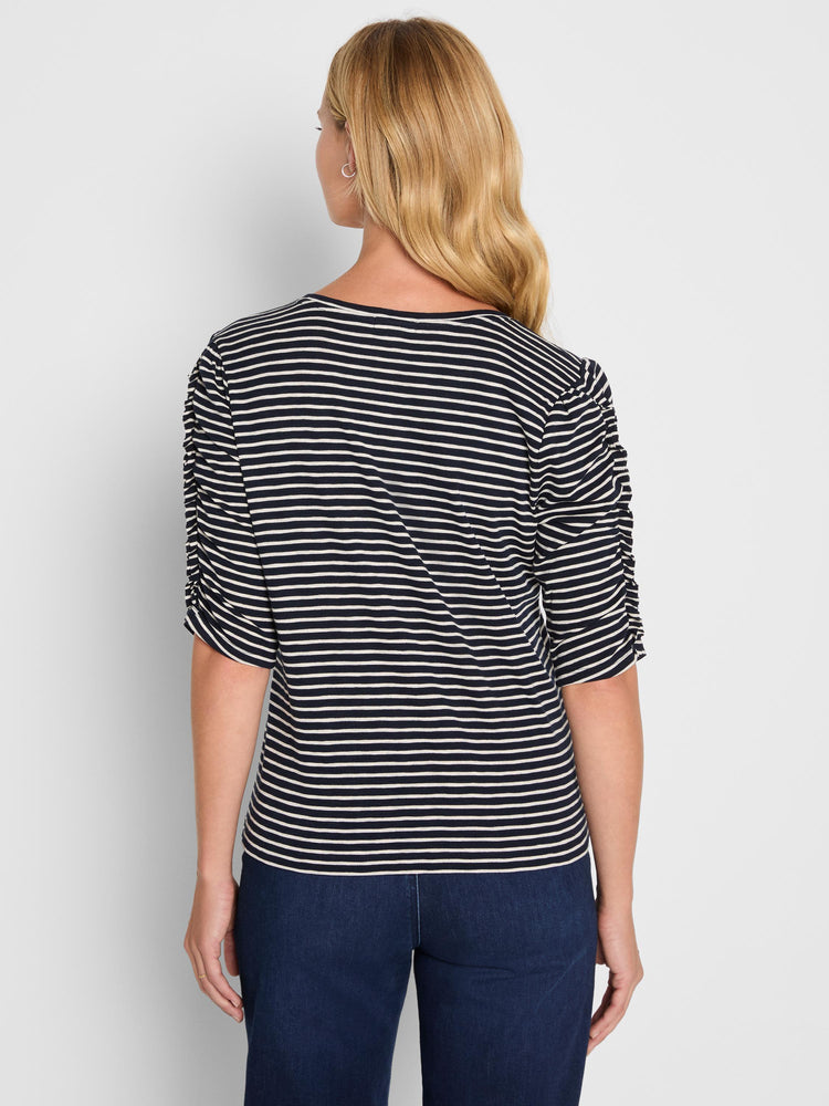 Navy and white striped knit tee featuring ruched three-quarter sleeves and a relaxed fit.