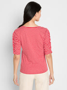 A fitted red and white striped top with a scoop neck and elbow-length sleeves featuring side ruching.