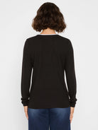 Black long-sleeve jersey tee with a visible white inner layer at the back neck. Person shown from behind.