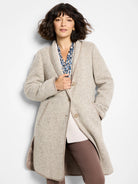 Beige herringbone wool coat with taupe trim, button front, and side pockets.