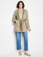 Beige quilted coat, taupe wool lining, belted waist.  Has pockets.