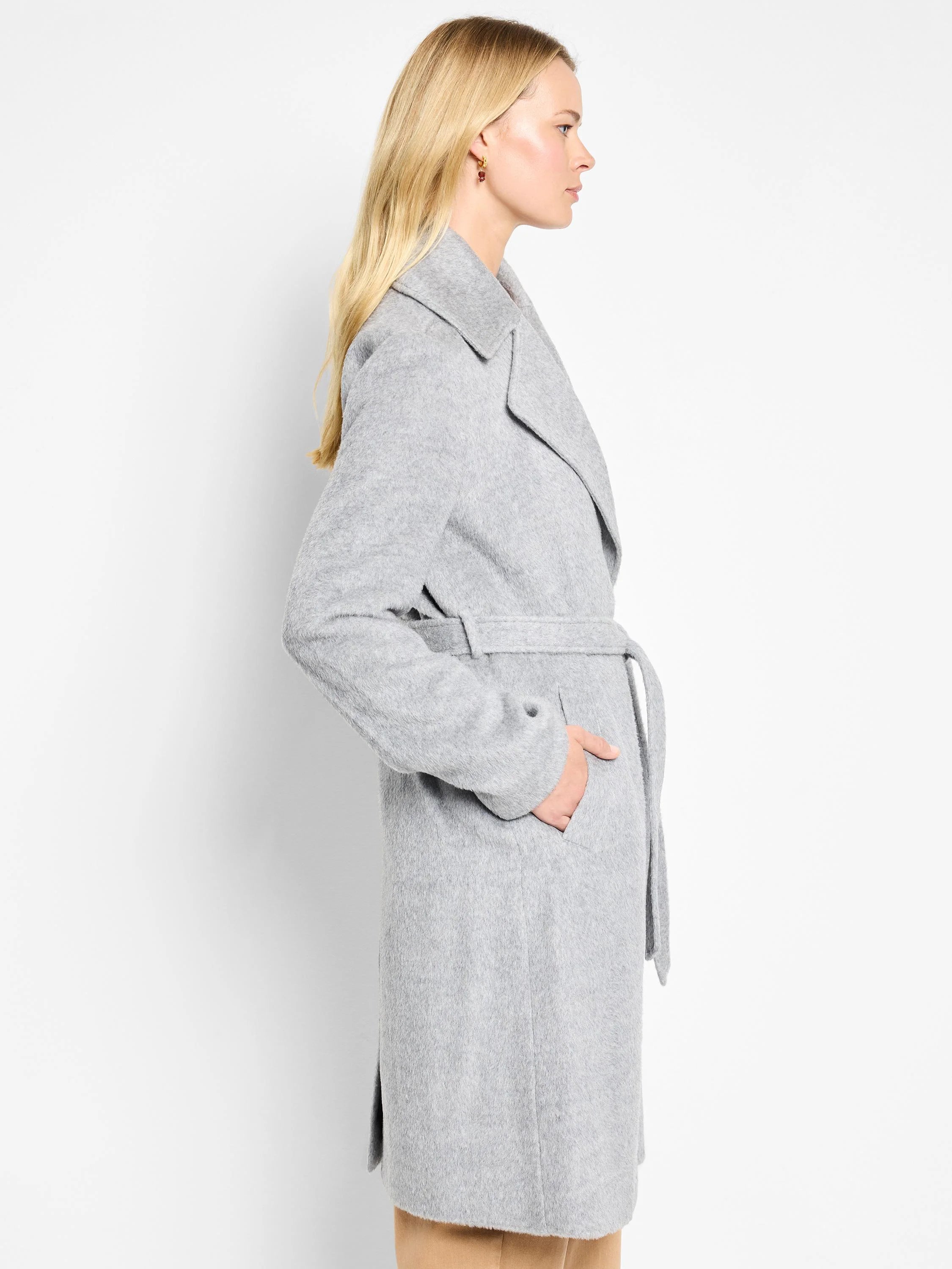 Light gray belted wrap coat, long sleeves, pockets.