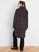 Dark/light gray jacquard top coat. Stand collar, rounded hem, black leather trim on collar and hem.