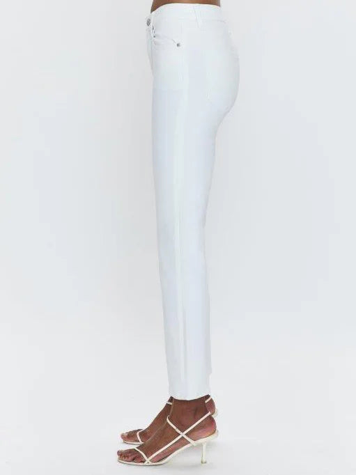 White high-rise crop boot jeans, side view. Fitted through thigh, subtle side seam, cropped above ankle.