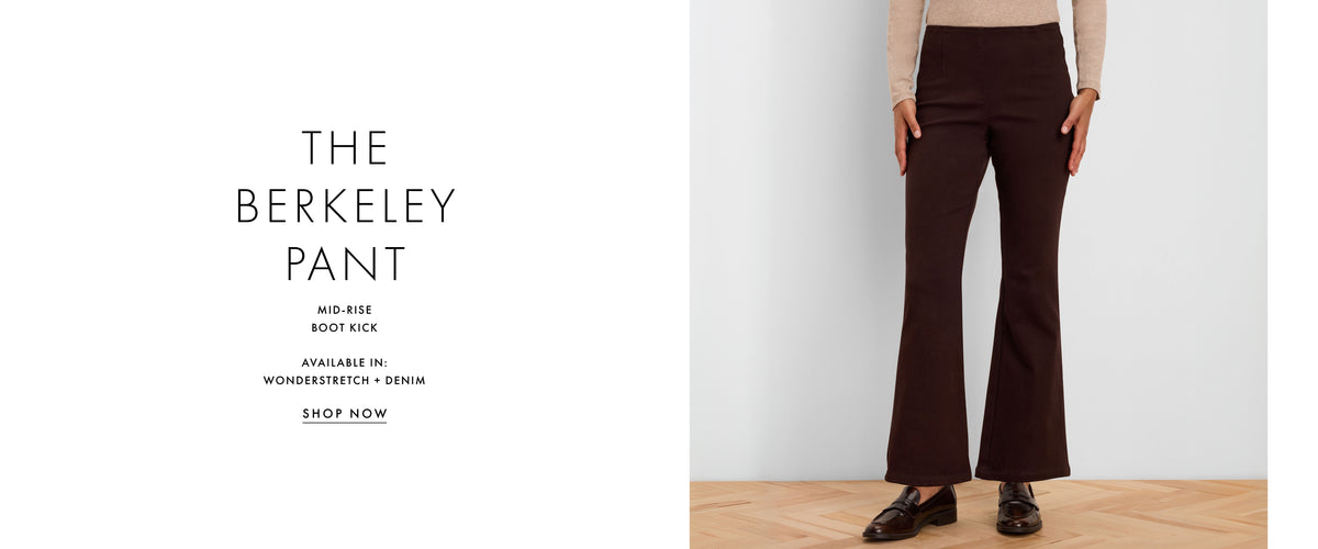 A model wearing dark brown mid-rise boot-kick pants stands against a light gray wall on a wood floor, with text on the left reading 'THE BERKELEY PANT' and smaller product details.