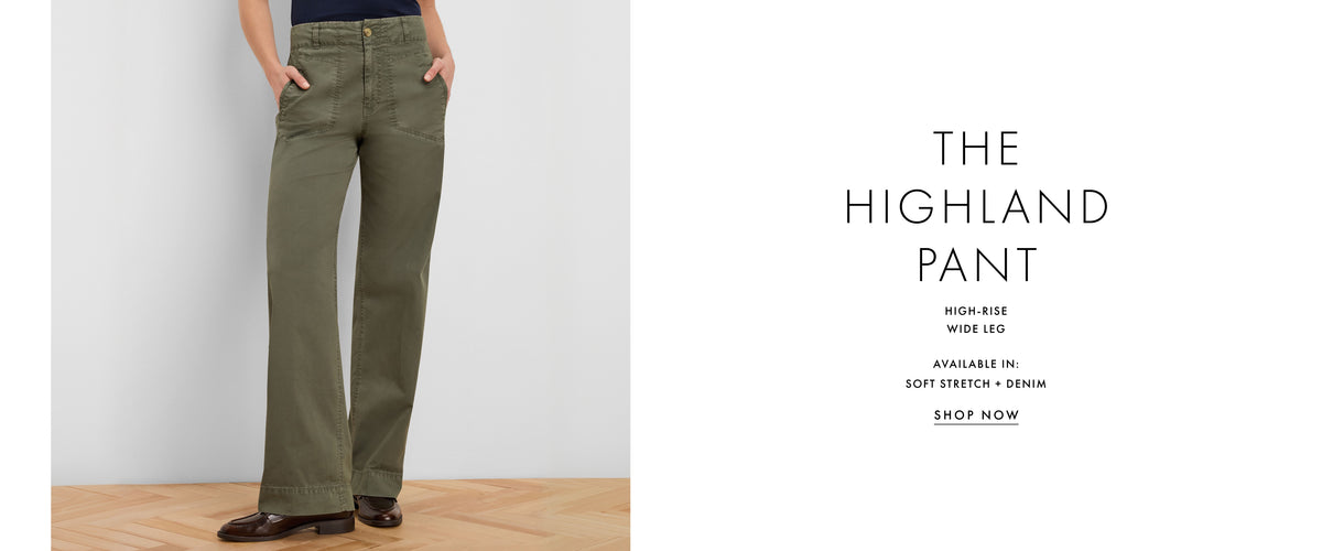 A model from the waist down wears olive green wide-leg pants with hands in pockets, standing on a light wood floor against a white wall. The right side of the image features text reading 'THE HIGHLAND PANT' with additional product details.