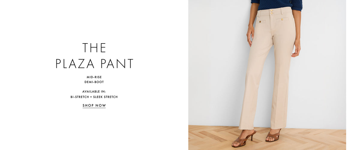 A model wearing a pair of mid-rise, straight-leg beige pants stands on a light wood floor against a white wall. The left side of the image features a white text panel reading 'THE PLAZA PANT' with product details and a 'SHOP NOW' button.