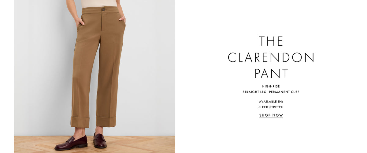 A model wearing tan straight-leg cropped pants and dark brown loafers stands against a light gray wall, with text on the right reading 'THE CLARENDON PANT' and additional product details.