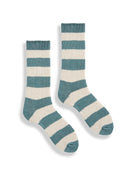 Cream crew socks with thick horizontal teal blue stripes. Ribbed cuffs, solid teal blue heels and toes.