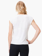 Off-white short-sleeve shirt, shown from the back.  The shirt has a slightly curved hem.