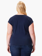 Dark navy blue, short-sleeved, v-neck top.  Shown from the back.