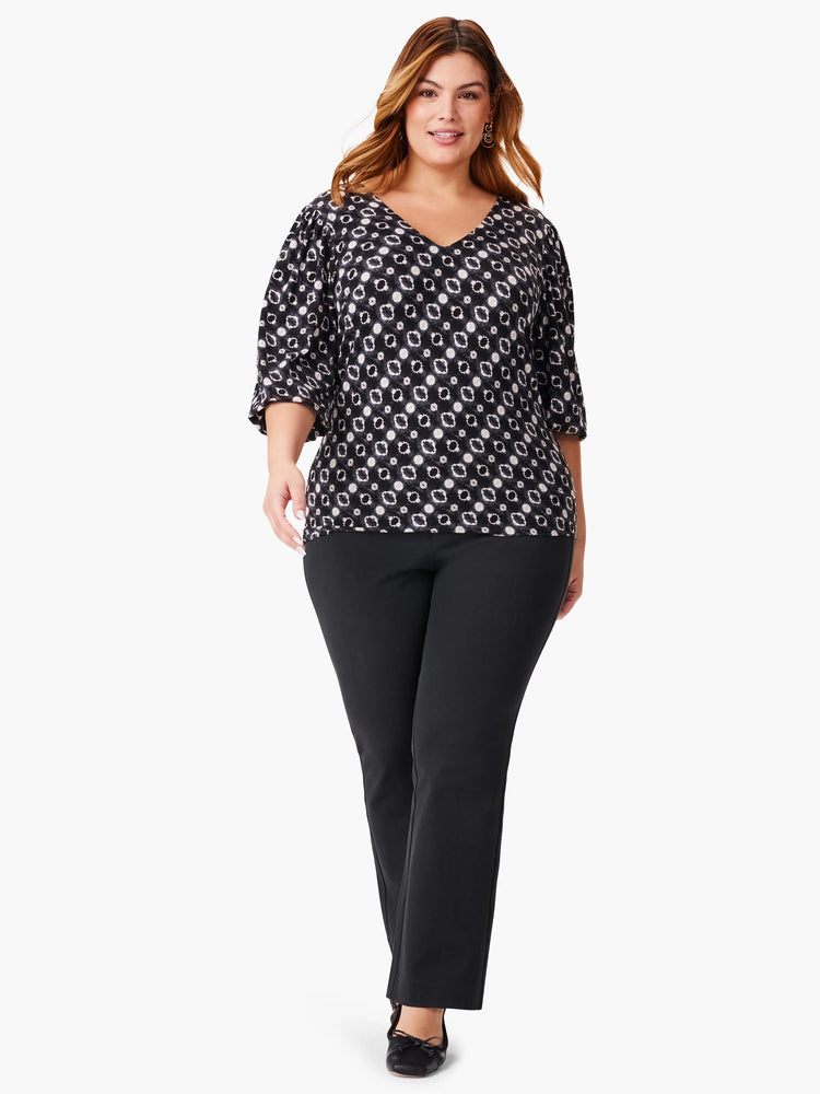 Black top with off-white pattern,  V-neck, 3/4 sleeves, and a slightly puffed sleeve.