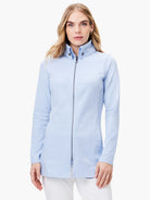Light blue, long-sleeved zip-up knit jacket.  High collar,  subtle seam details.
