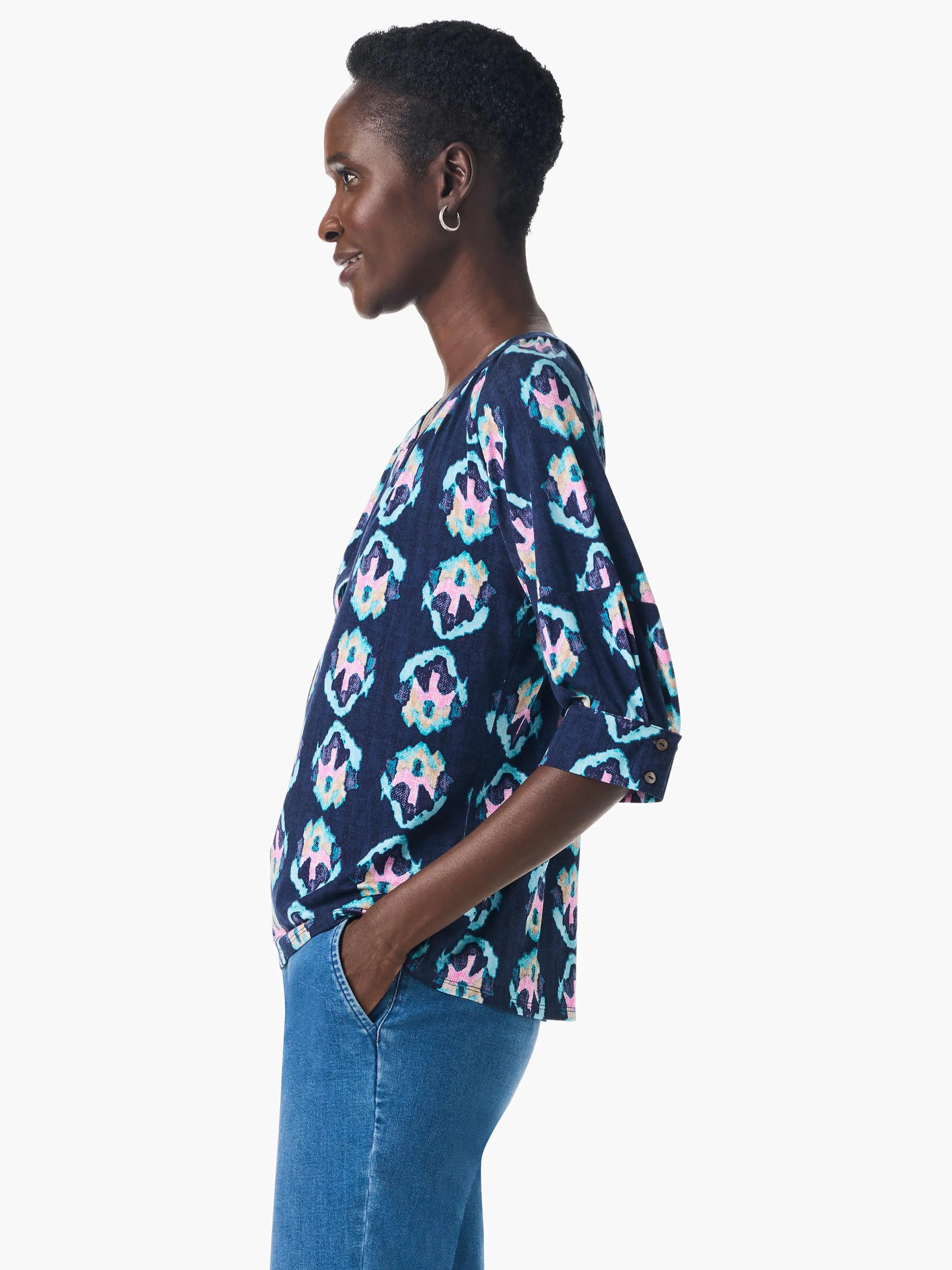 Navy top with teal, pink & beige batik pattern. Three-quarter sleeves, button cuffs.