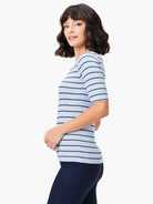 Light blue boatneck top with dark blue horizontal stripes, short sleeves, ribbed knit fabric.