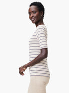 Beige shirt with thin, dark stripes; boatneck, short sleeves.