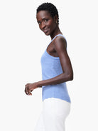 Blue and white striped, ribbed knit tank top; high neck, sleeveless.