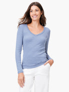 Blue and white striped, long-sleeve v-neck shirt; ribbed knit fabric.