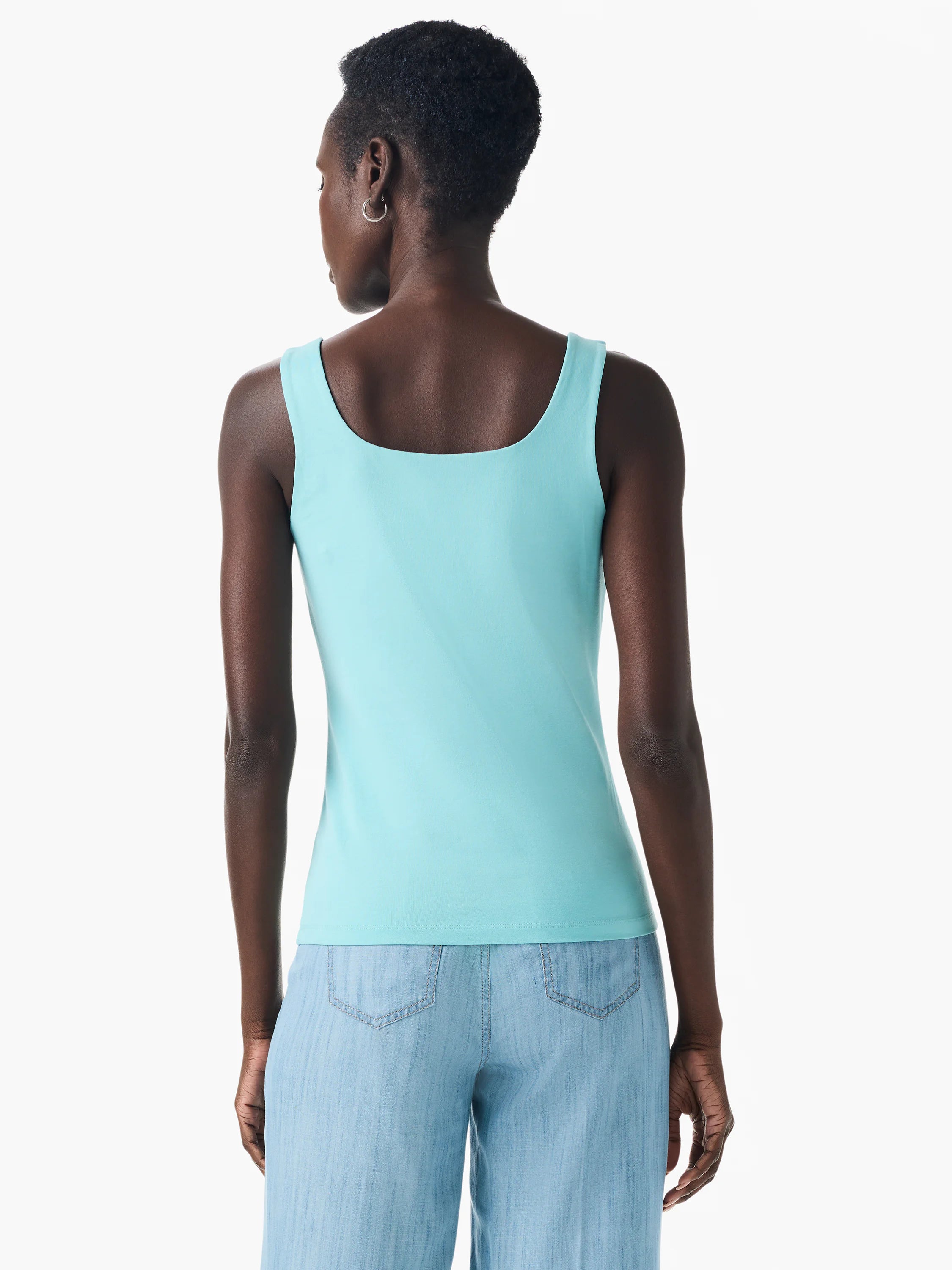 Back view: Aqua tank top with a square back neckline. Sleeveless and fitted.