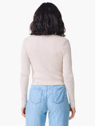 Beige ribbed cardigan, long sleeves, shown from the back.