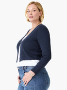 Navy ribbed long-sleeve cropped cardigan with an open V-neck front.