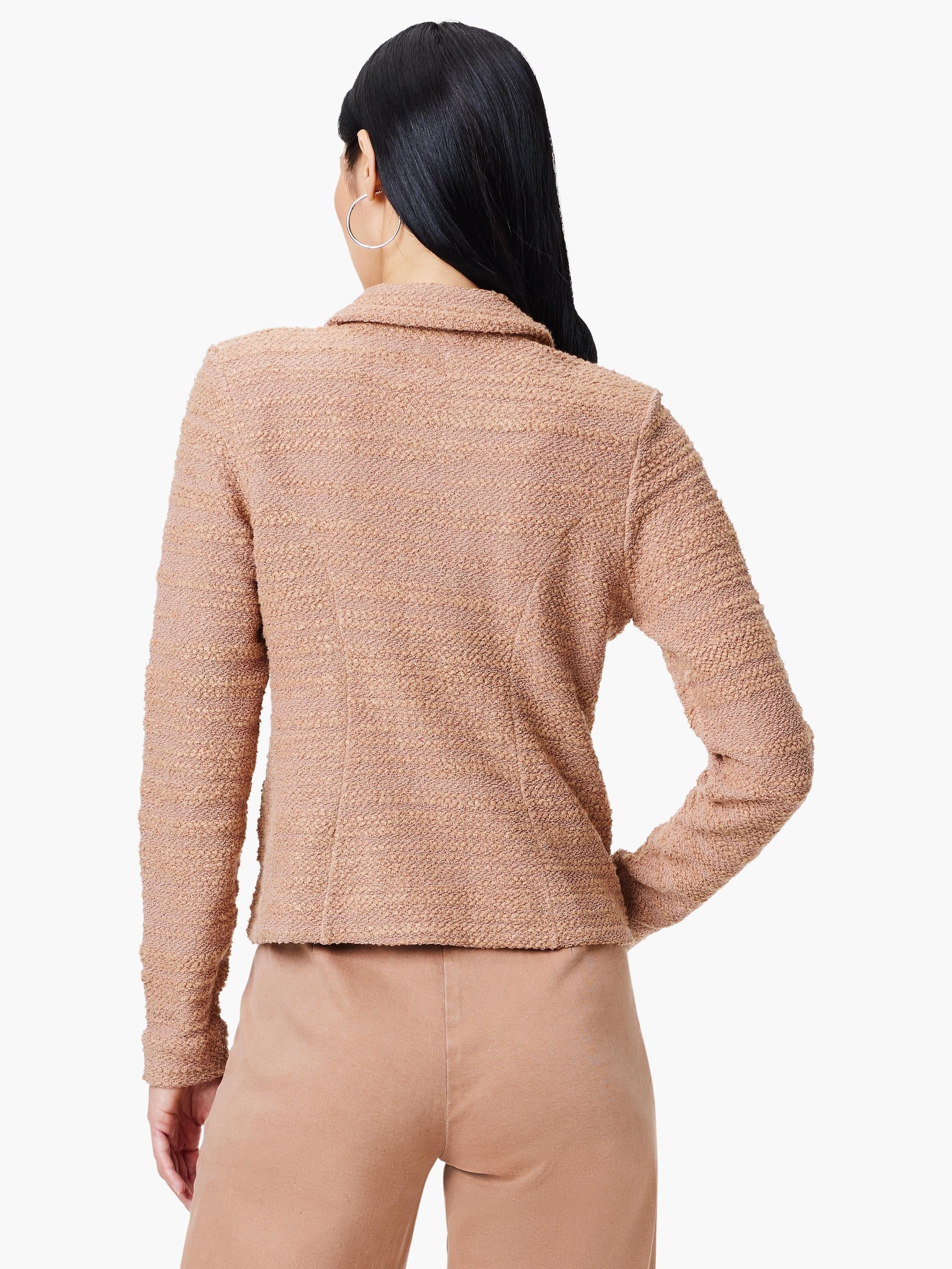Beige textured knit jacket, long sleeves, collared.  Shown from the back.