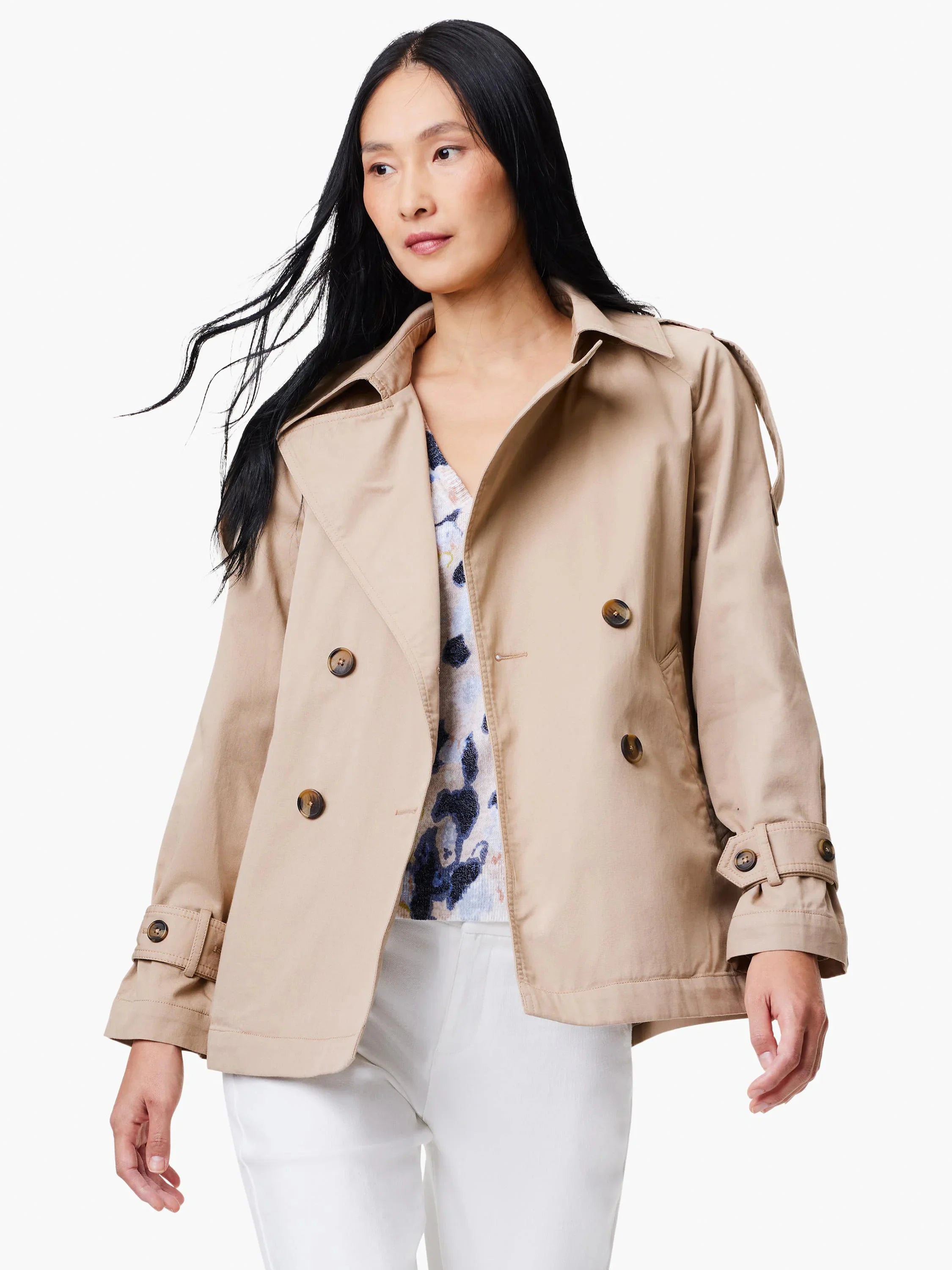 Beige double-breasted trench coat with brown buttons and cuffed sleeves.