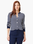 Navy blue and white striped cardigan, button front, three-quarter sleeves.