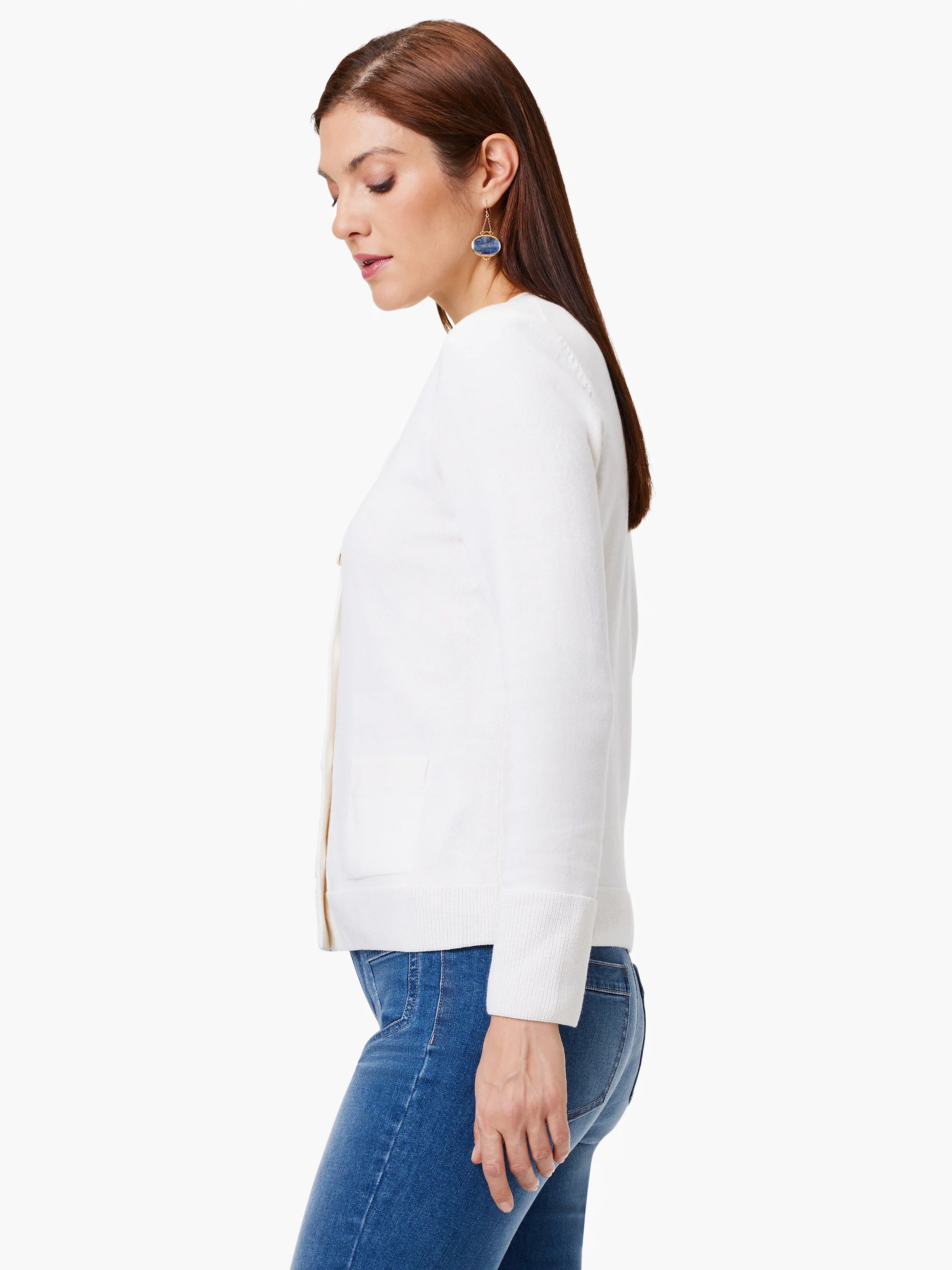 Off-white cardigan, long sleeves, single button closure, patch pocket.