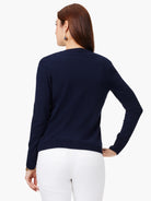 Dark navy blue, long-sleeved cardigan, shown from the back.  Simple design.