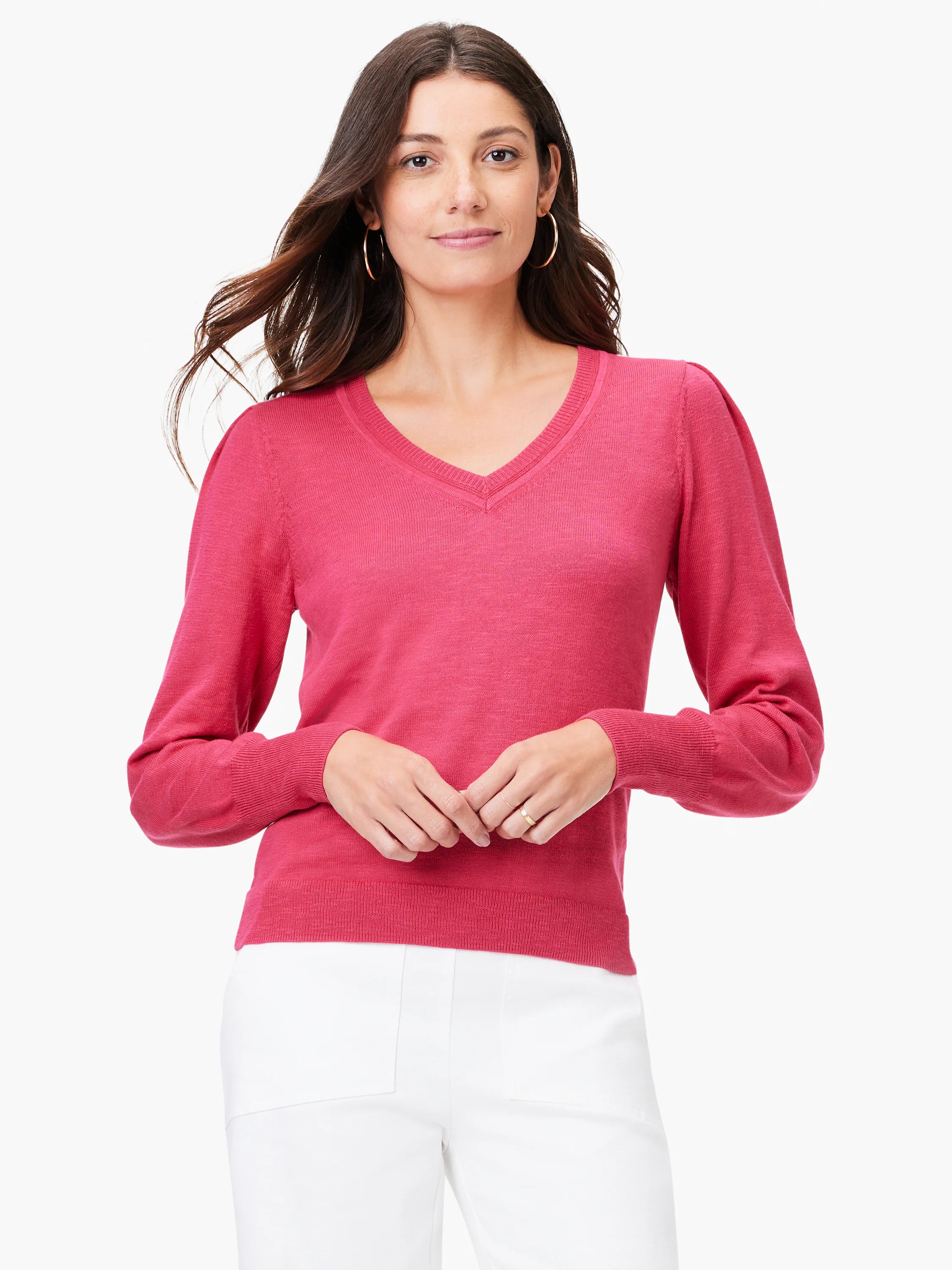 Pink slub V-neck sweater with long sleeves and slightly puffed shoulders.