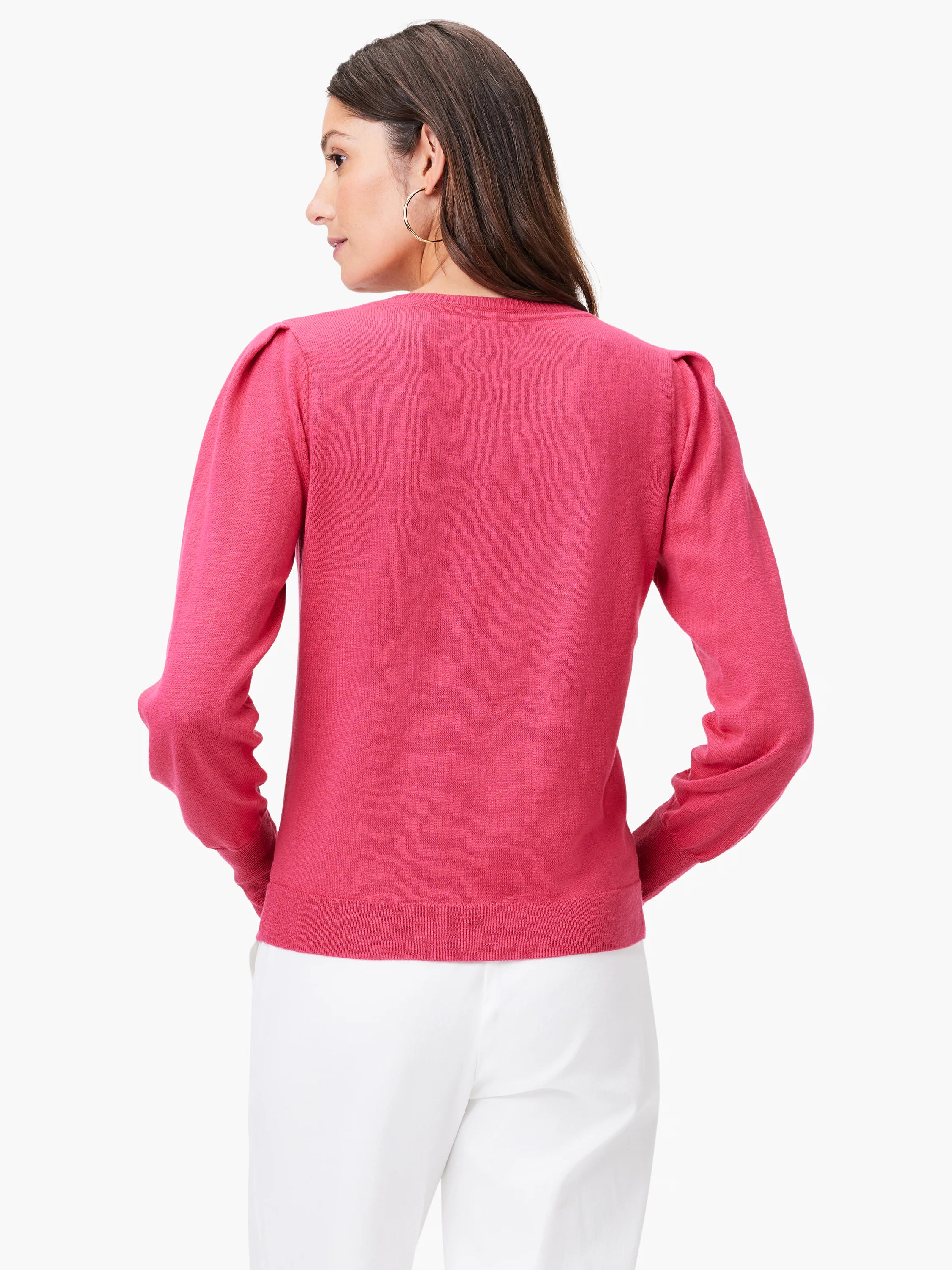 Pink slub V-neck sweater with slightly puffed long sleeves.  Back view.