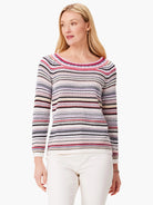 Horizontal striped sweater.  Colors: off-white, black, dark purple, pink, beige.  Long sleeves, boat neck.