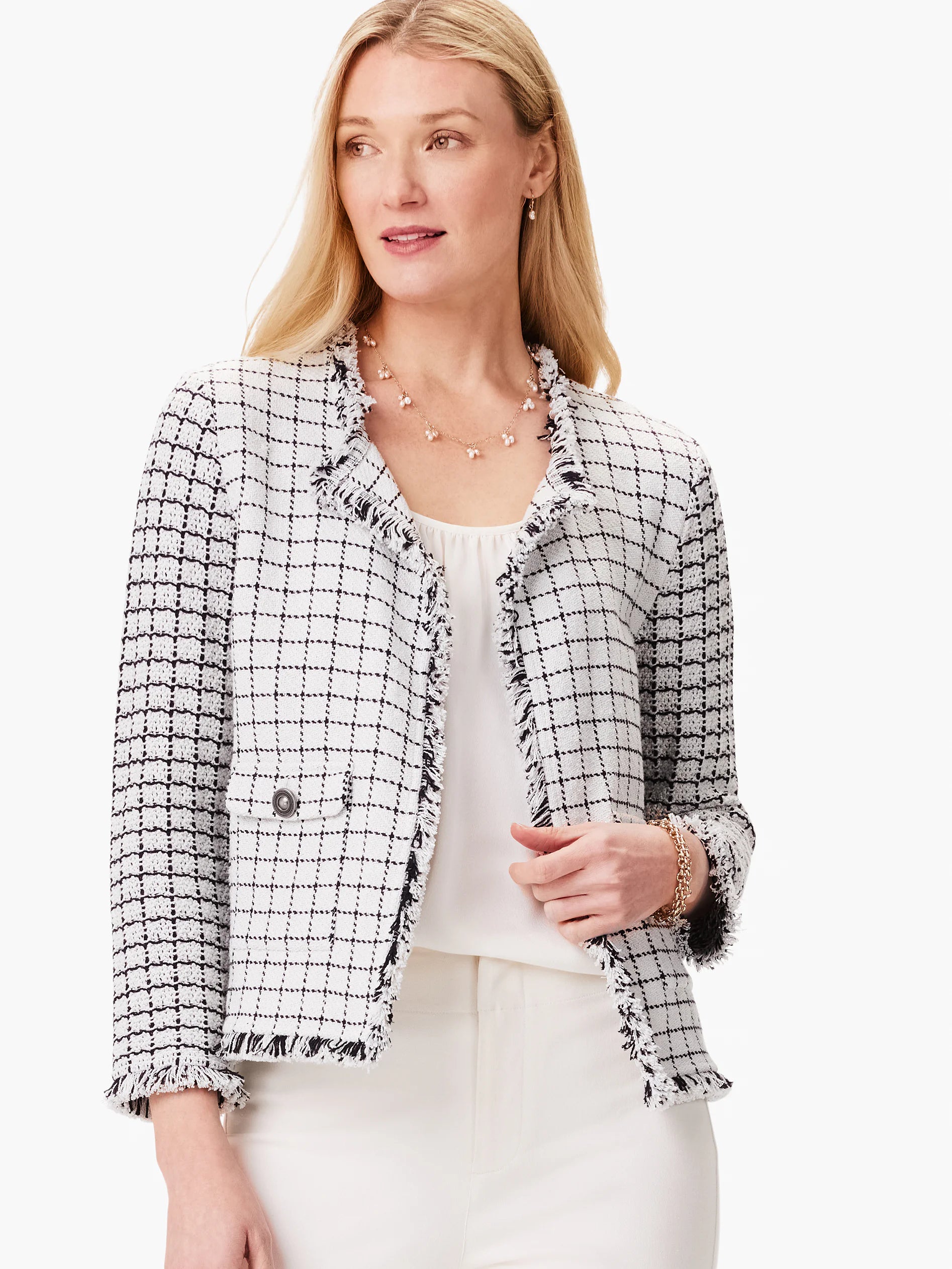 Off-white jacket with black grid pattern & frayed edges.  Three-quarter sleeves, pockets, and double-breasted closure.