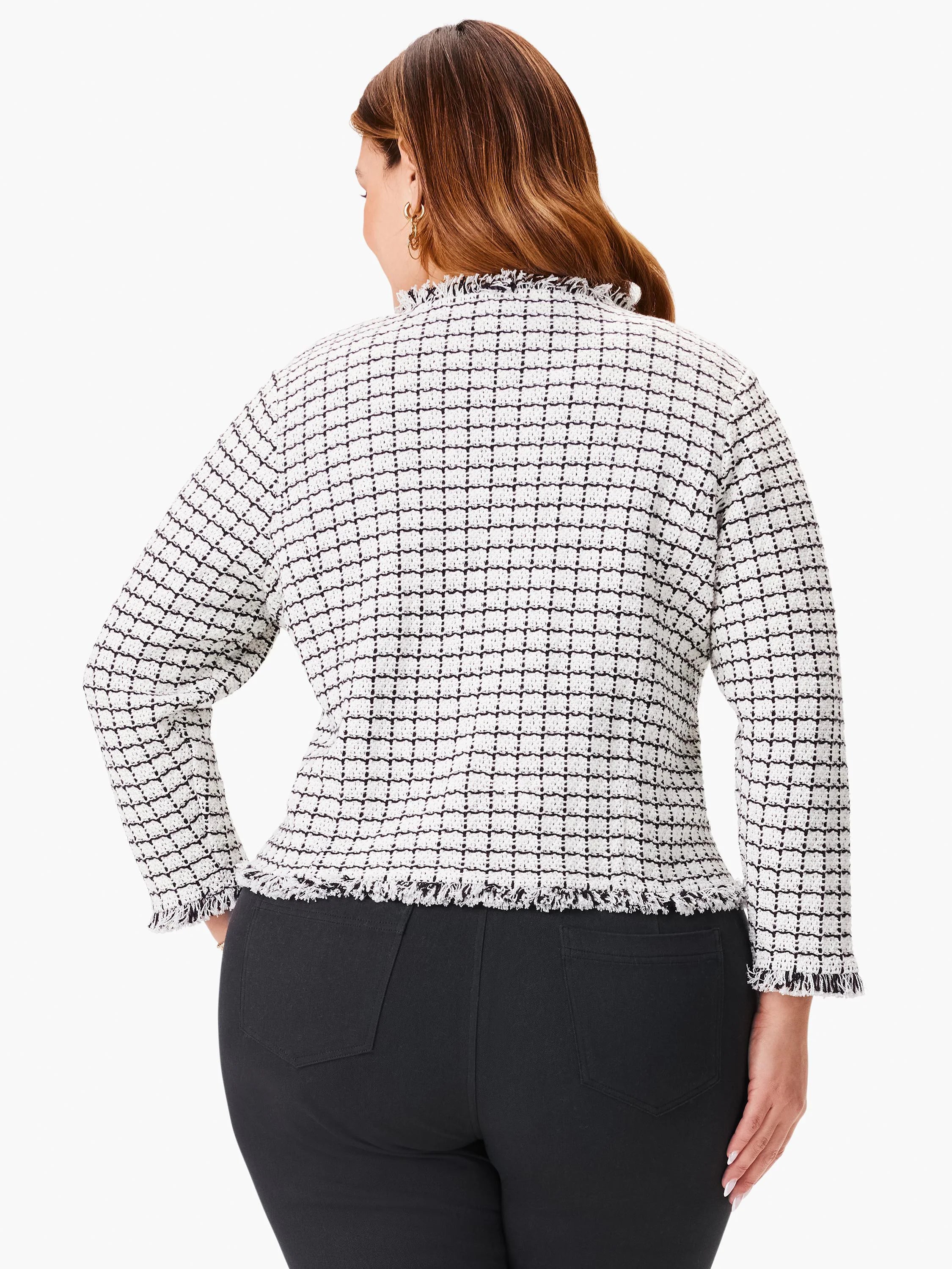 Off-white jacket with a black grid pattern and frayed edges. Long sleeves.