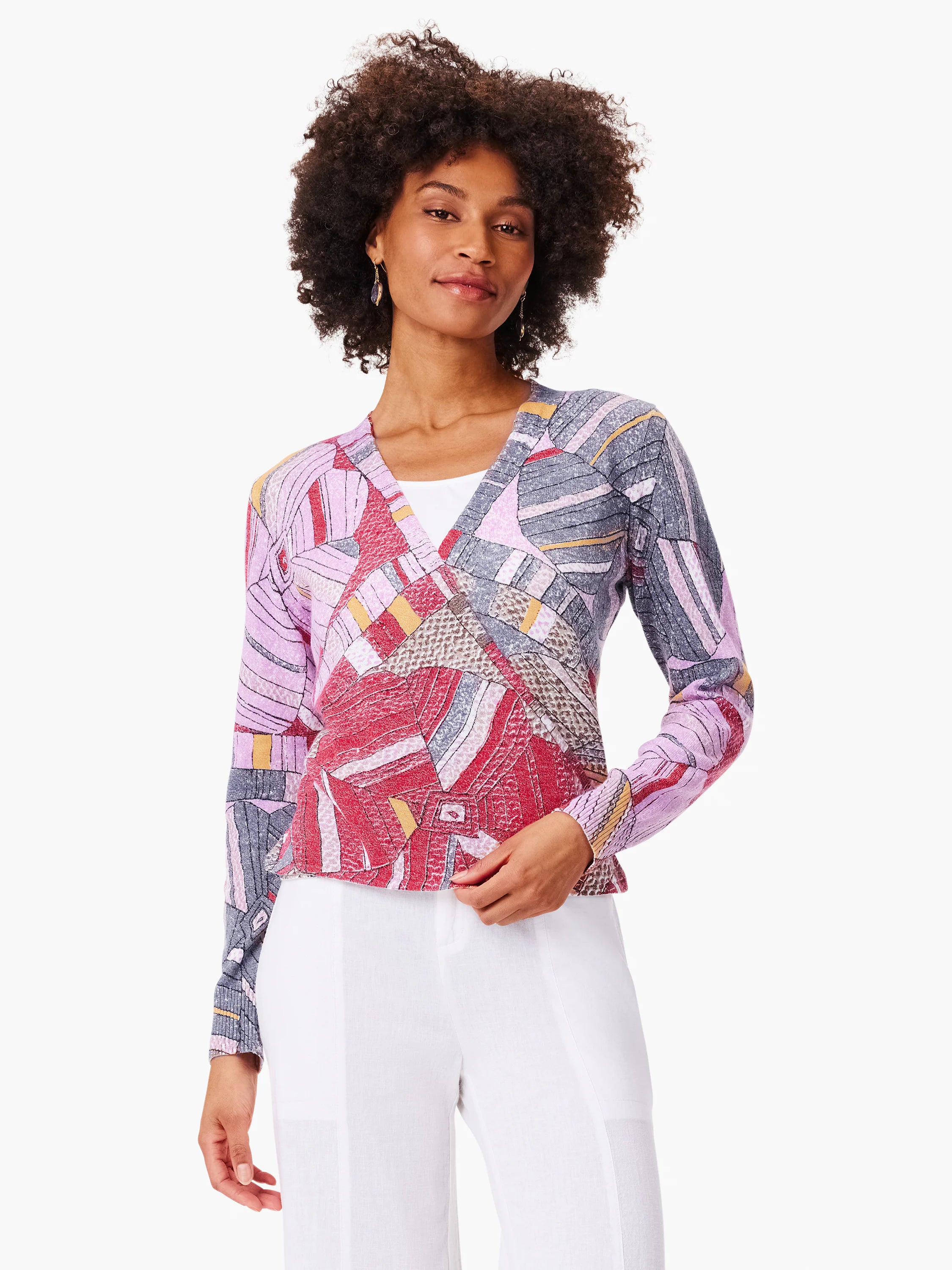 4-way cardigan with abstract mosaic floral print in pinks, purples, grays, and golds.  Long sleeves, V-neck.