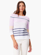 Horizontal stripes in lavender, white, gray, beige, and burgundy on a 3/4 sleeve sweater.