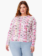 Geo Mosaic Sweater.  White base with pink, gray, and beige abstract blocks. Long sleeves, crew neck.